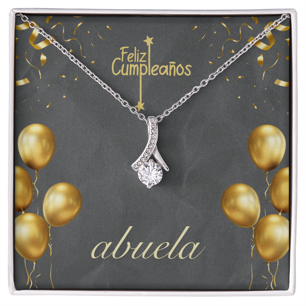 Una cadena de plata con un dije de cristal brillante en forma de gota, presentada en una caja de regalo con fondo gris oscuro. La tarjeta de fondo tiene el texto en español "Feliz Cumpleaños" en la parte superior y "abuela" en letra cursiva blanca en la parte inferior, adornada con ilustraciones de globos y confeti dorados.
2. How to Change the Techni