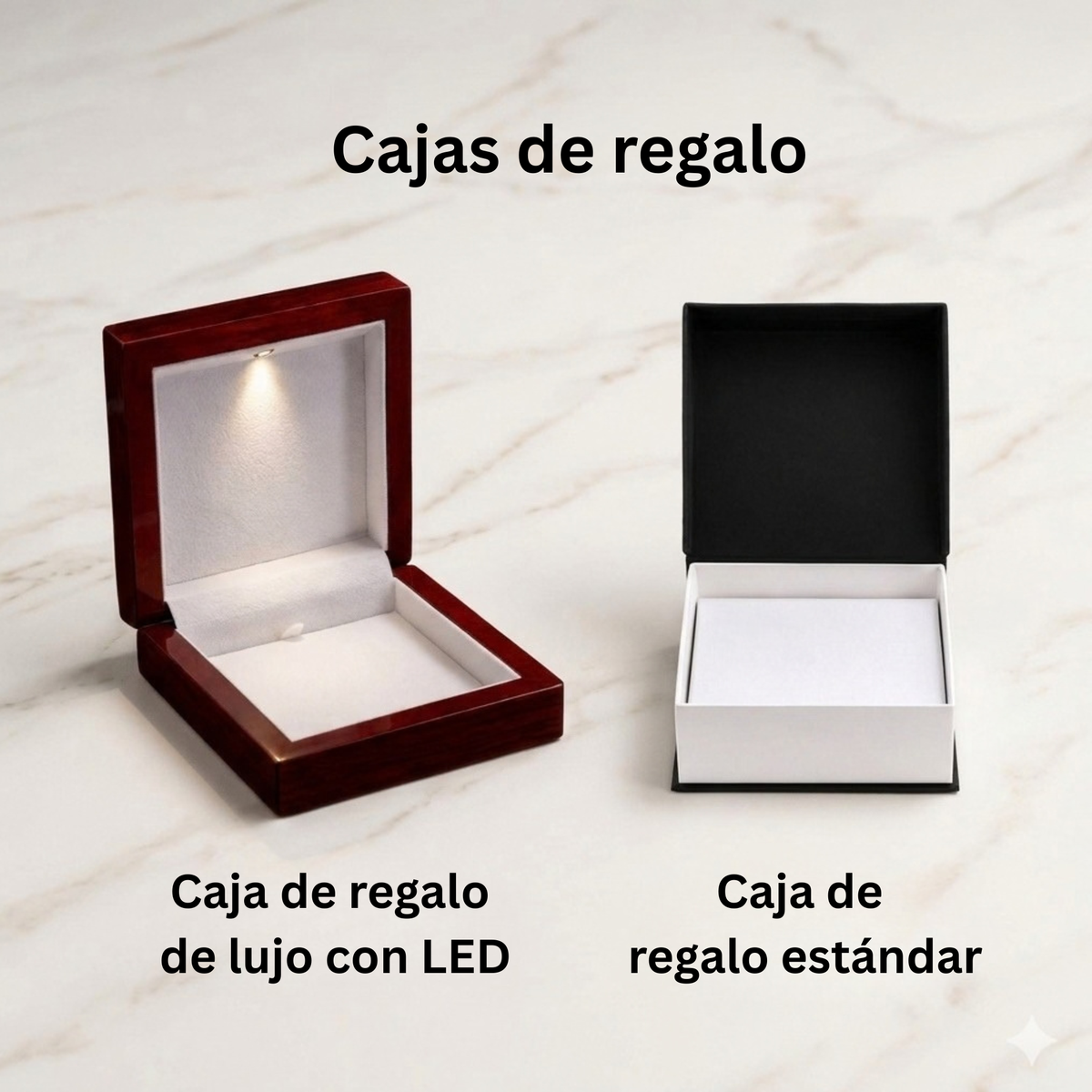 Dos cajas de regalo sobre una superficie de mármol claro: una caja de madera abierta de color marrón rojizo oscuro, con interior blanco y luz LED integrada, etiquetada como Caja de regalo de lujo con LED, y una caja de regalo estándar cerrada en blanco y negro, etiquetada como «Caja de regalo estándar». El texto en español en la parte superior dice Cajas de regalo.