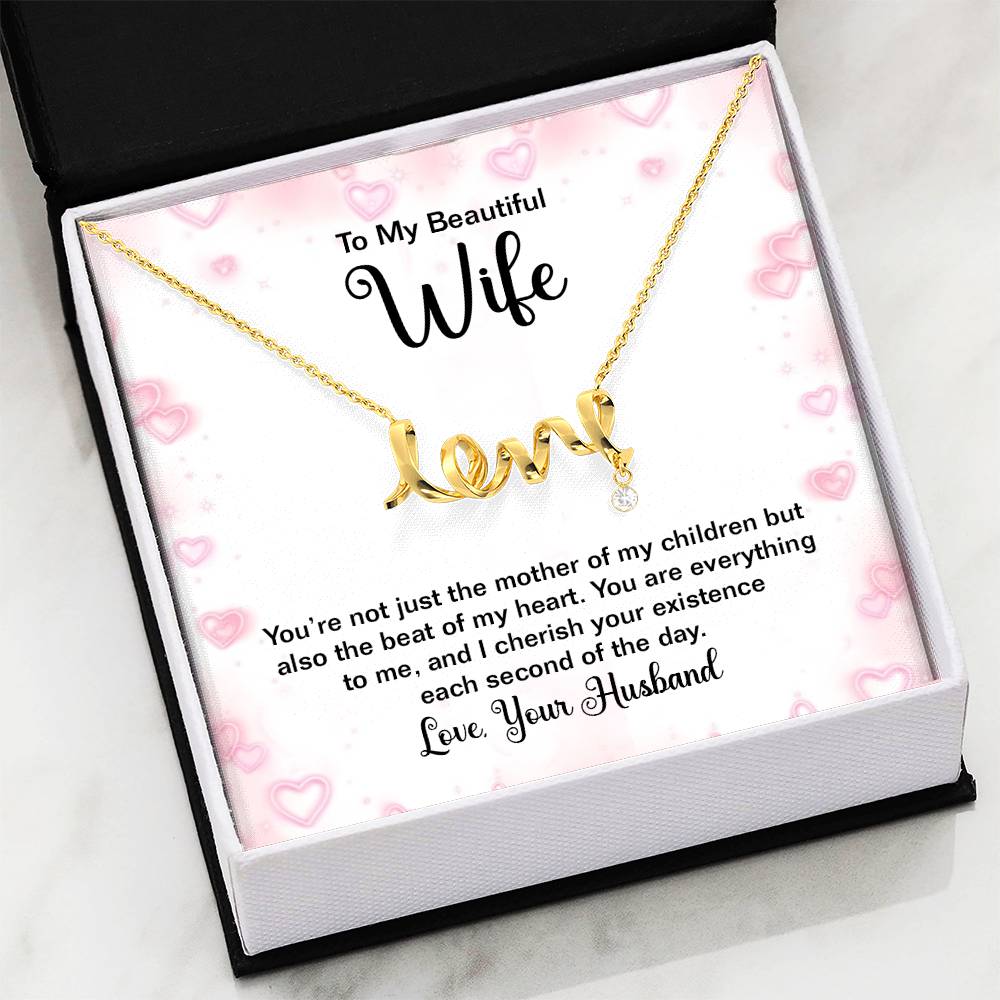 gold-tone scripted love necklace with a to my beautiful wife card in a black and white gift box.