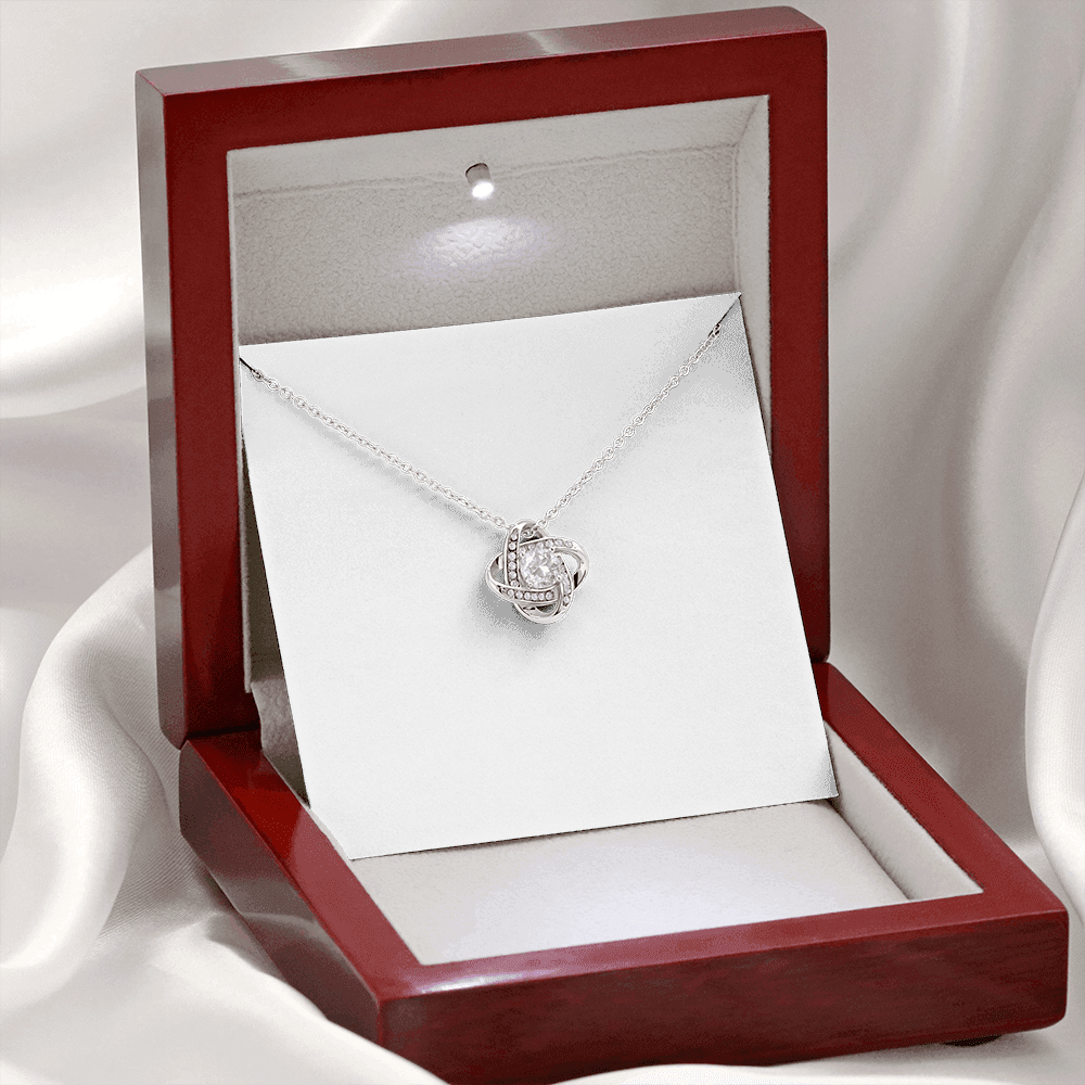 Necklace with a card in a wooden box, featuring a message to 'Mother-in-Law'.