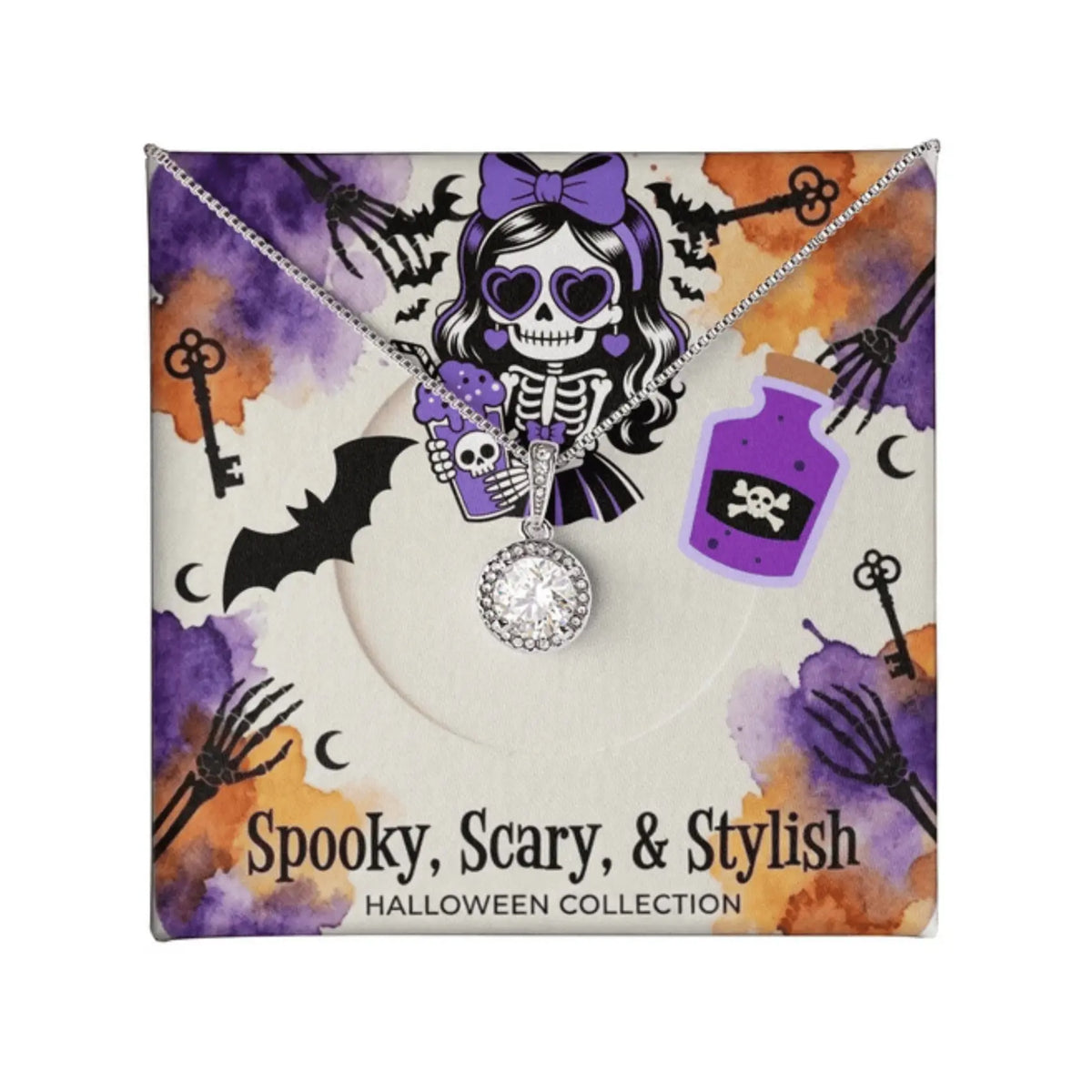 A silver-toned necklace with a clear rhinestone pendant is displayed on a decorative Halloween-themed card. The card features a cartoon skeleton girl with a purple bow, black bats, purple and orange watercolor splashes, and the text 'Spooky, Scary, & Stylish HALLOWEEN COLLECTION'.