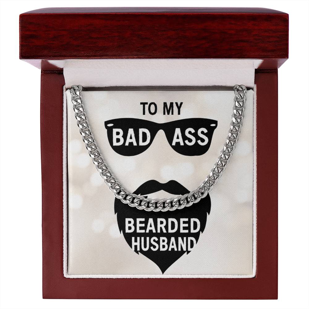 silver cuban link chain sitting in a dark wood gift box that says to my badass bearded husband.
